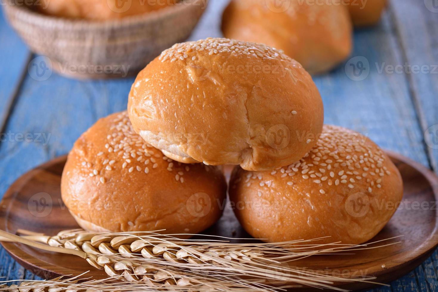 Bread in wood plate photo