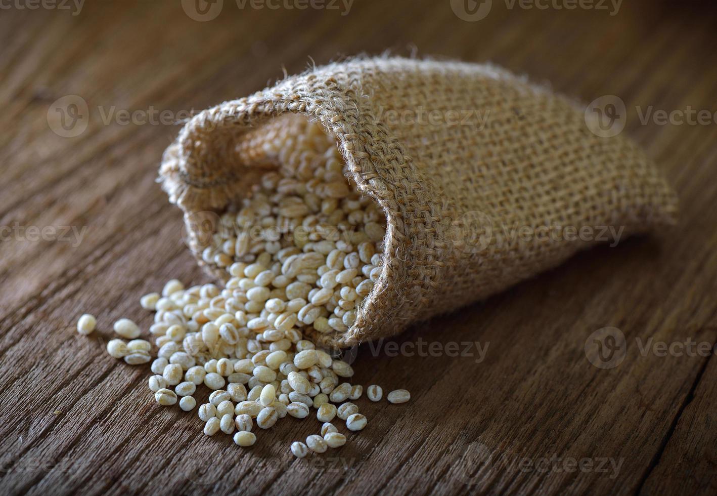 pearl barley in sacks against photo