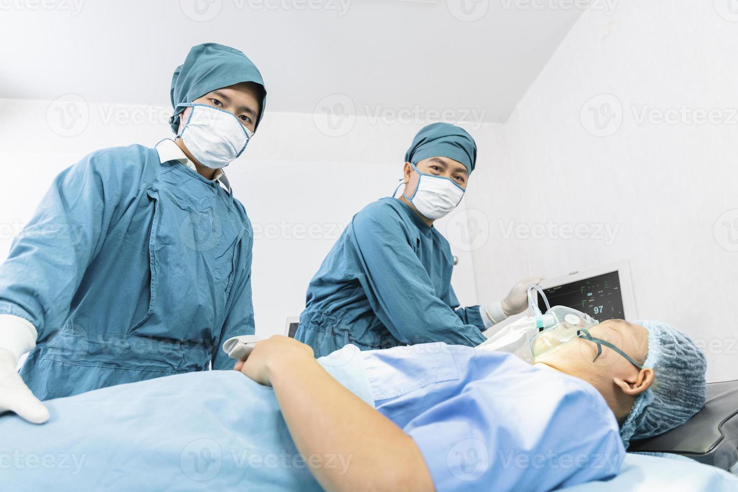 The surgeon encouraged the patient after the surgery was completed. photo