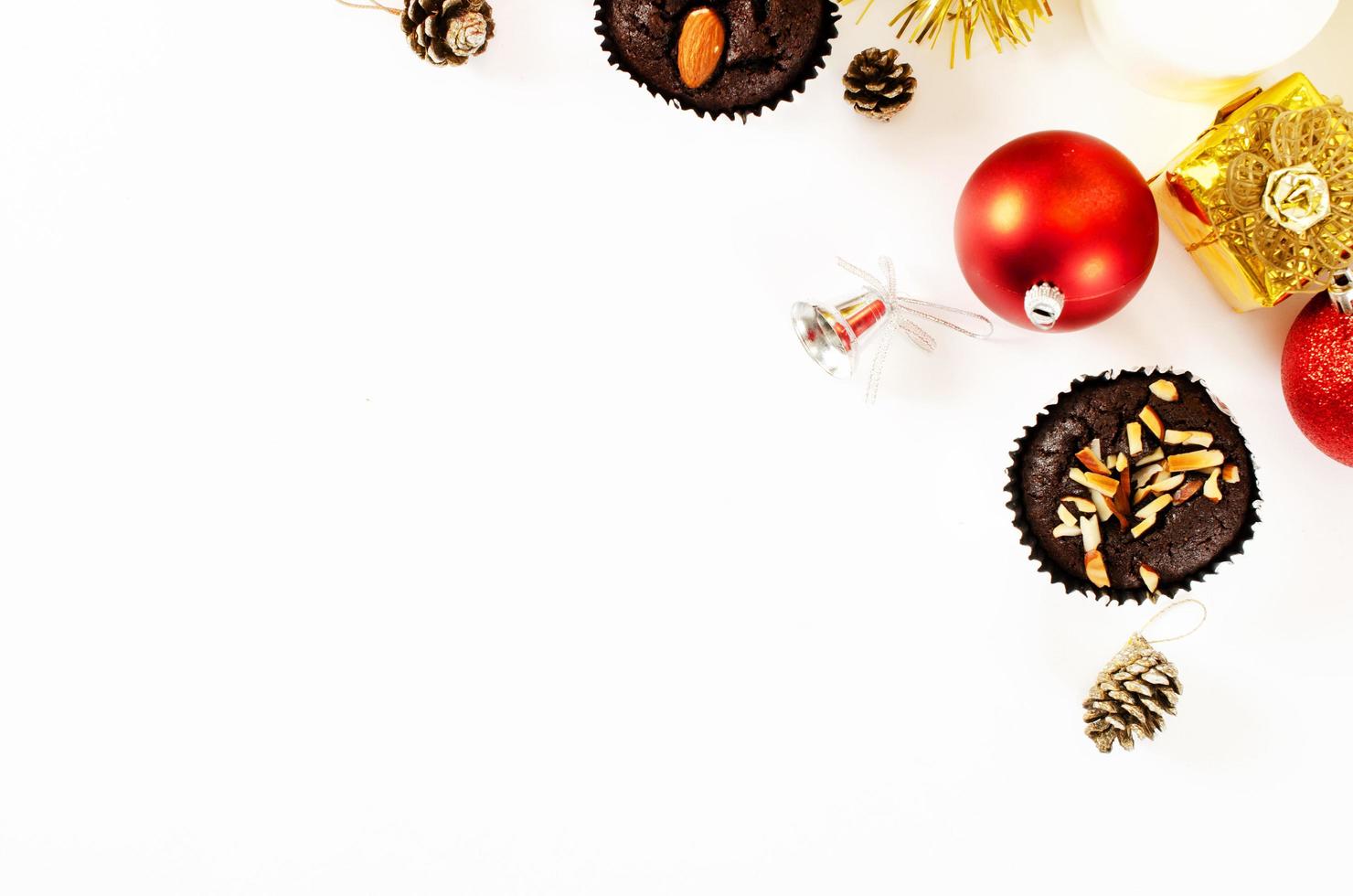 Chocolate brownie and christmas decoration on white backgrounds above, Top views photo