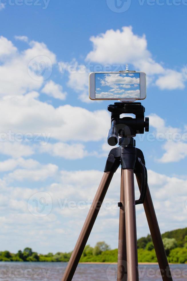 Using smartphone like professional photo camera on tripod