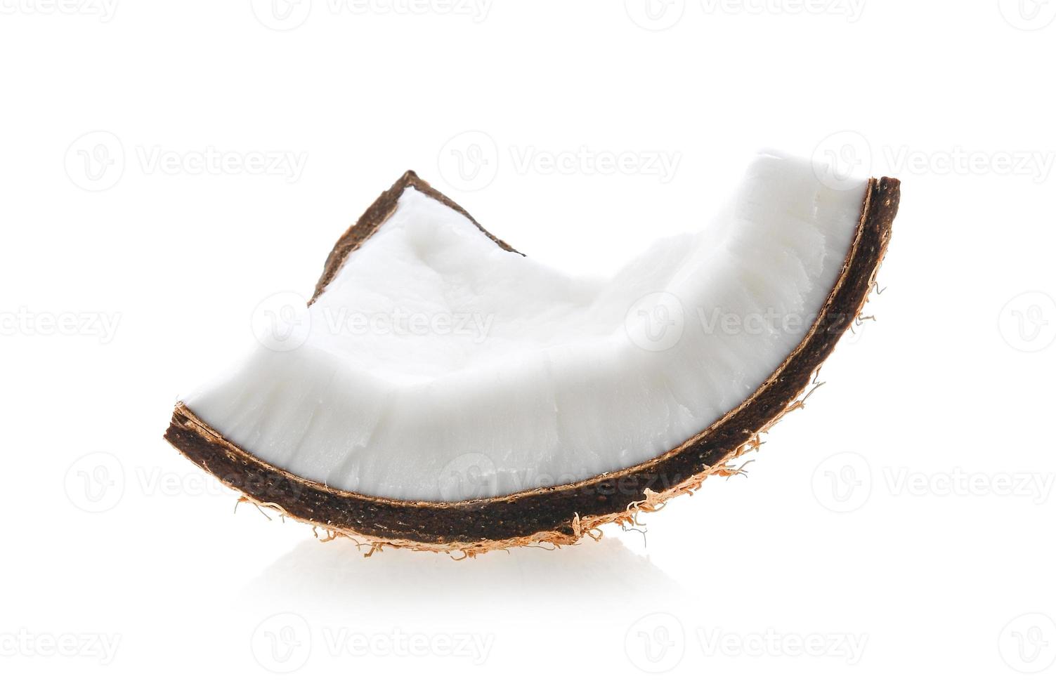 Coconut pieces isolated on a white background. photo