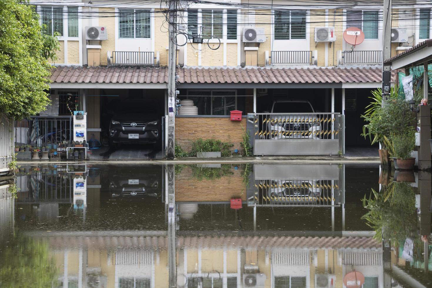 NONTHABURI, THAILAND-NOVEMBER 4, 2021 Low-Level Alley Flooding in The Pruksa Ville. photo