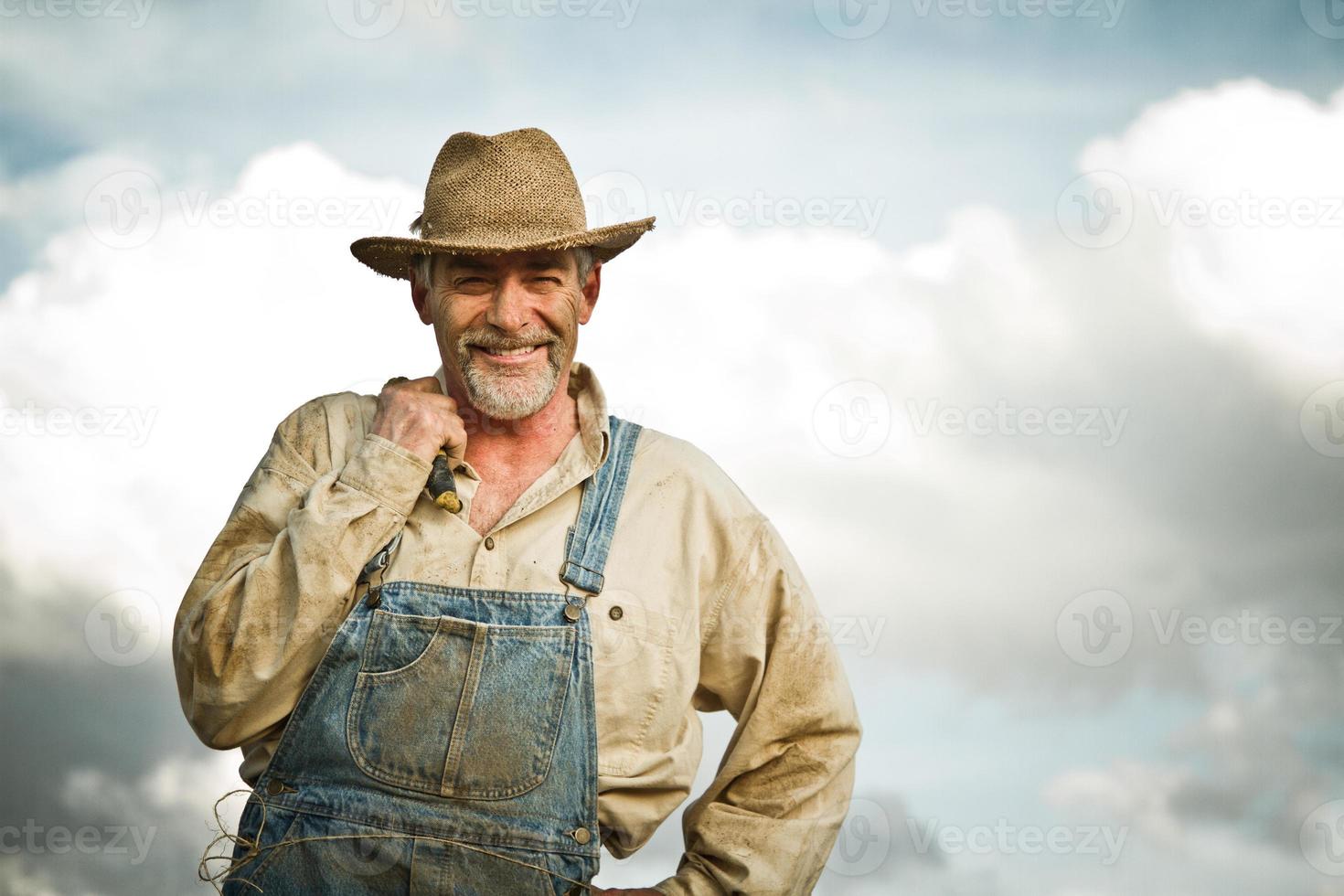 1930s farmer smiling at the camera photo