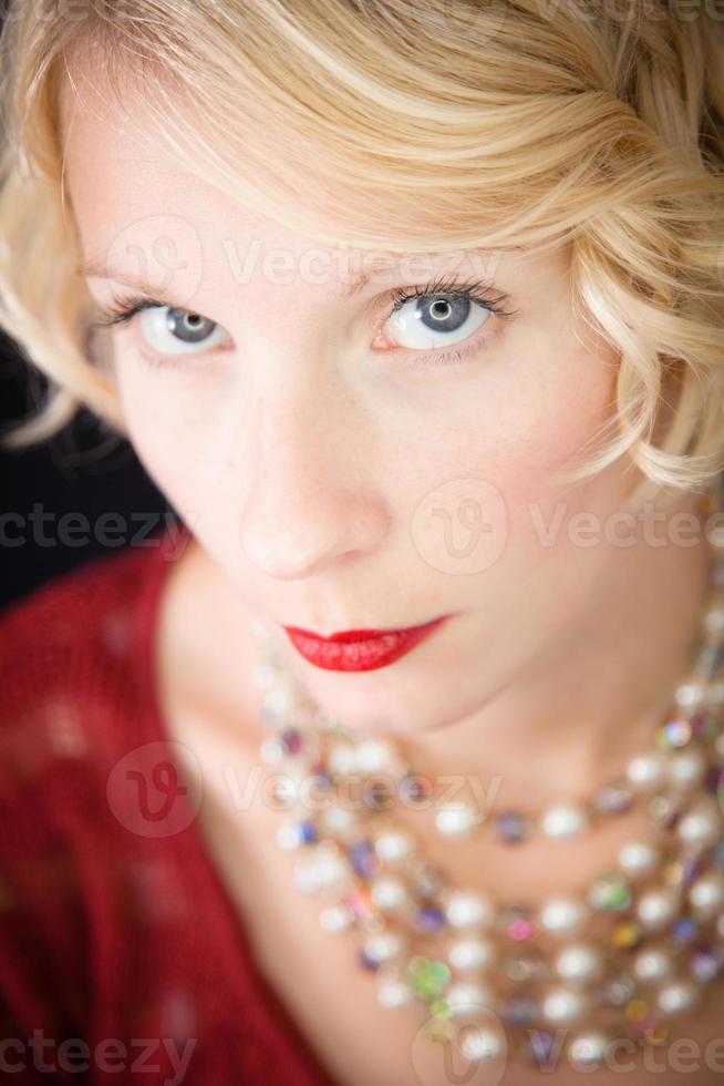 Beautiful blond serious lady portrait photo