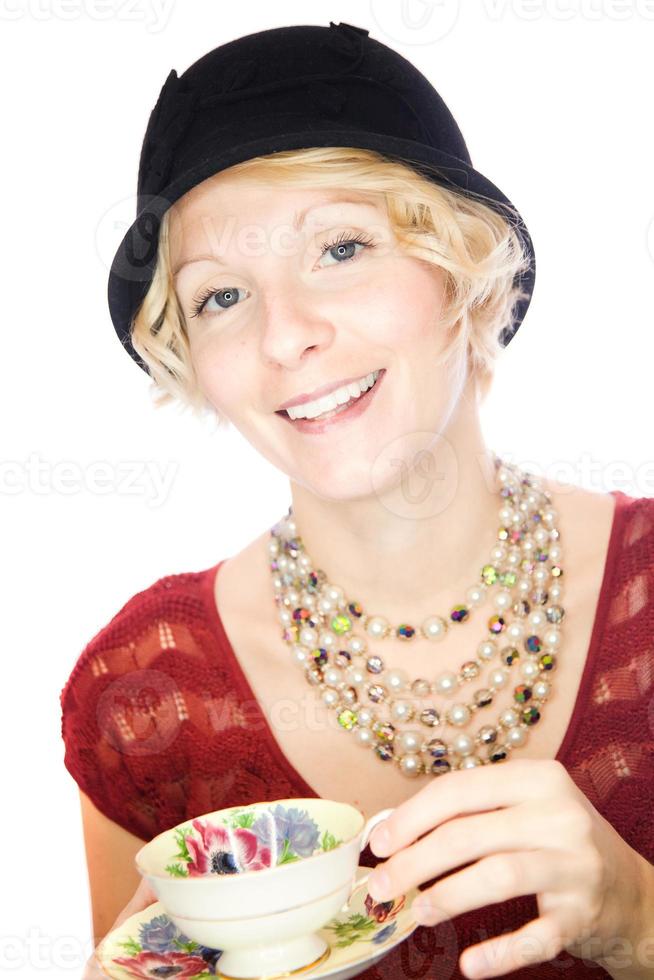 Beautiful lady portrait holding a cup of tea photo