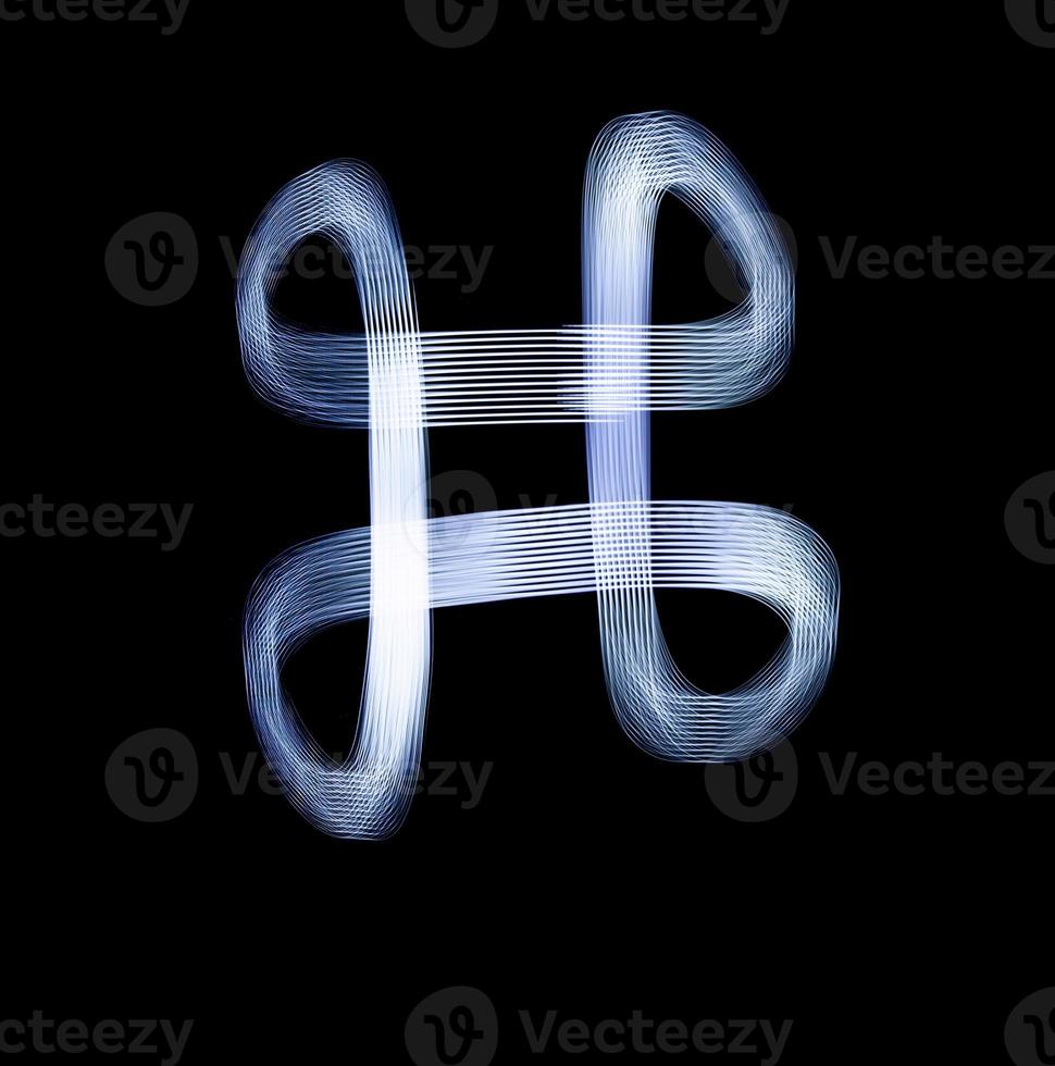 Command Key Symbol Icon Using Light Painting Technique photo