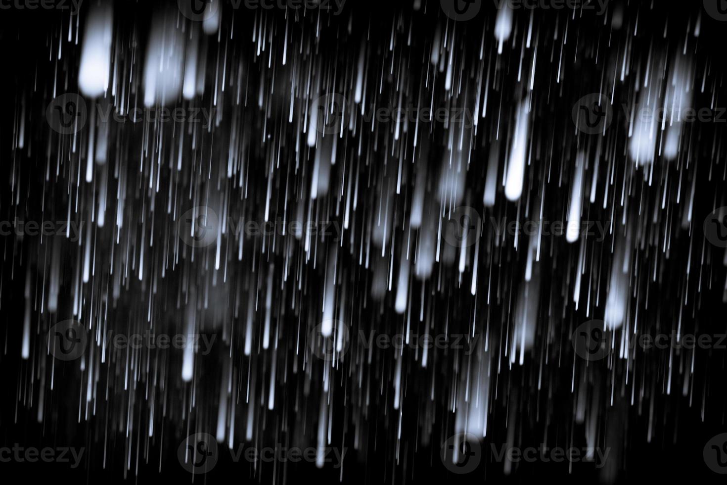 lluvia de asteroides sobre negro foto