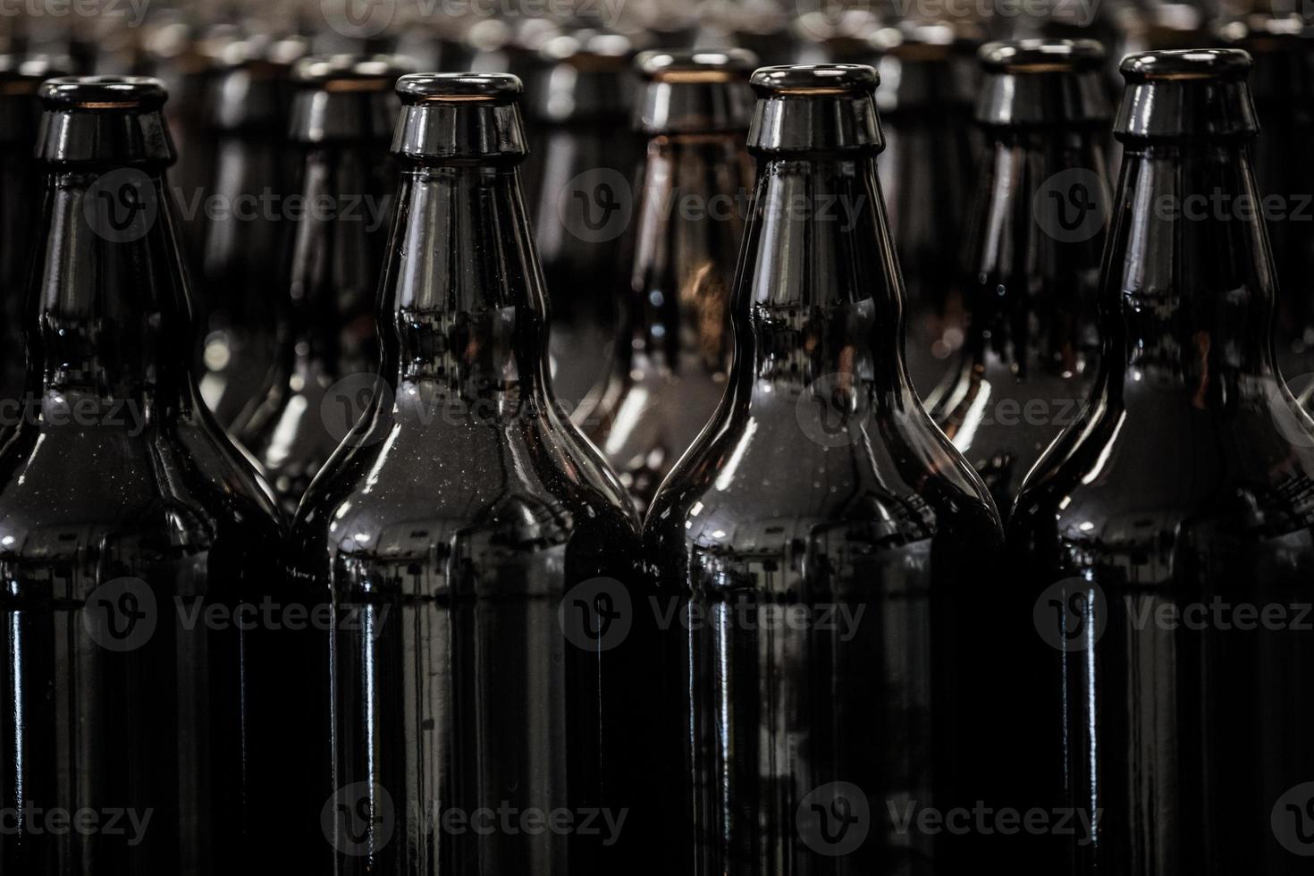 Empty bottles on factory photo