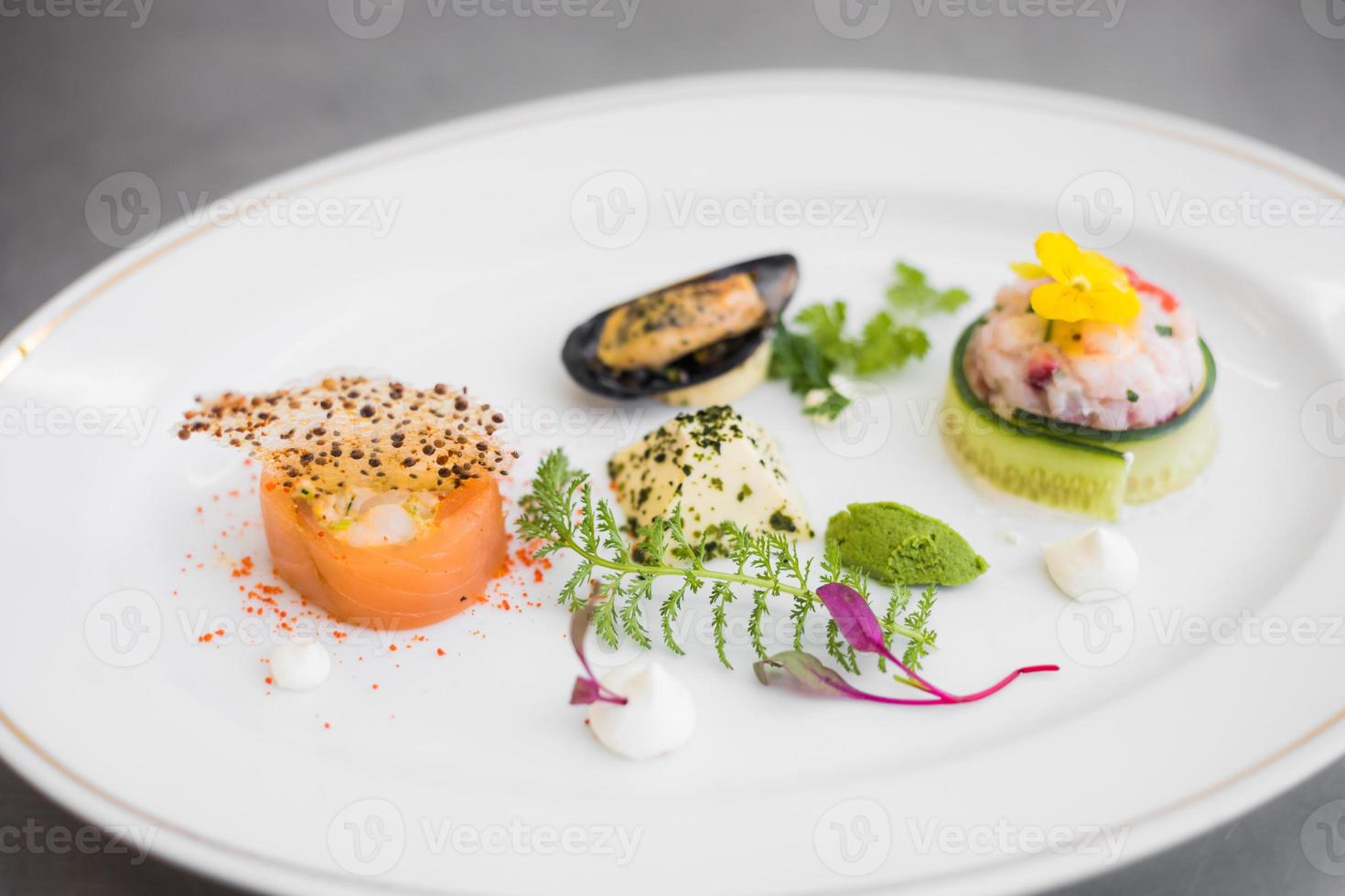 Appetizing seafood on plate photo