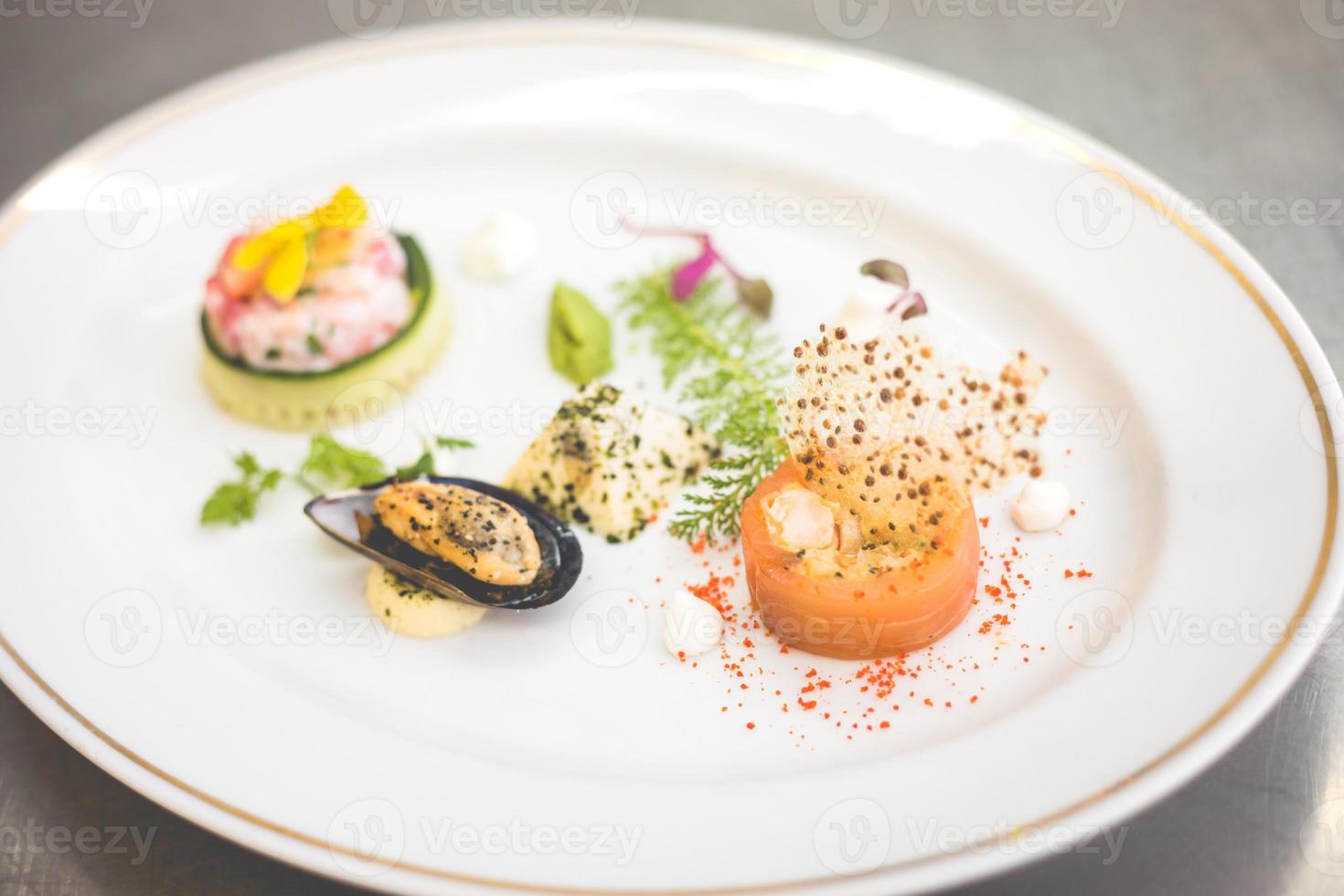 Seafood appetizers on plate photo