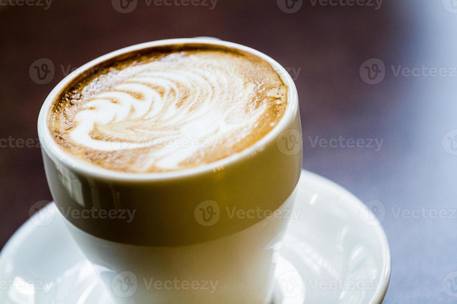 Latte Coffee on a table photo