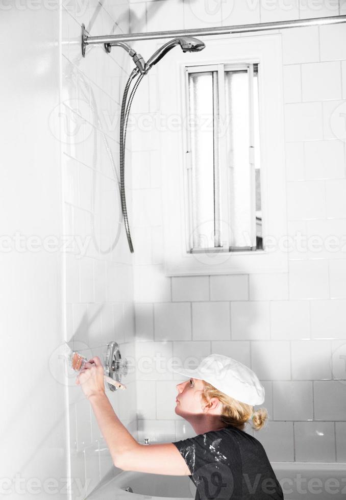 Woman Painting in the Bathroom photo