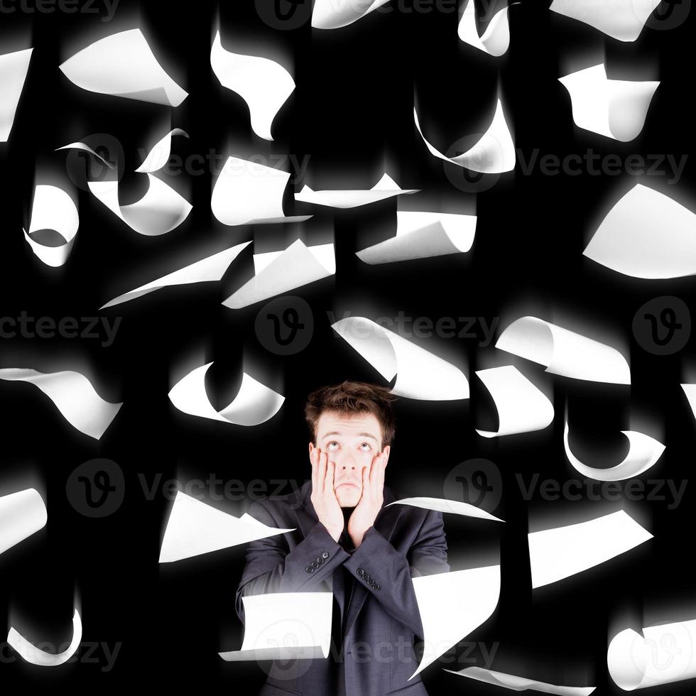 Despaired businessman over black background photo