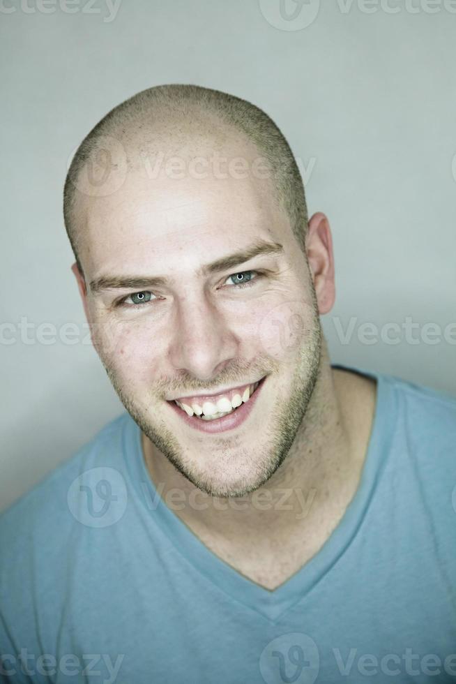 Happy portrait on gray background photo