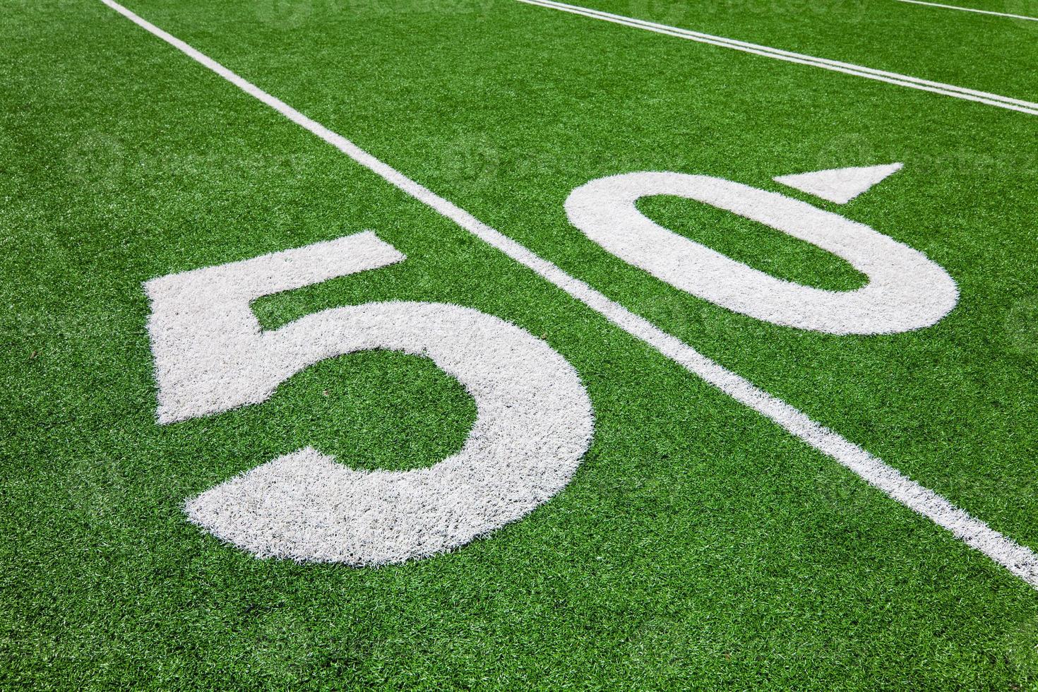 fifty yard line - football field photo