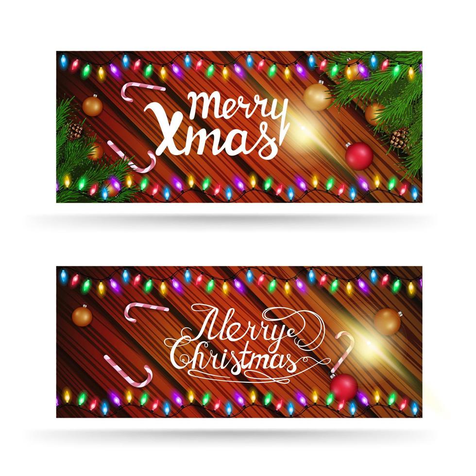 feliz navidad, tarjetas de felicitación con guirnaldas, ramas de árboles de navidad y fondo de madera vector