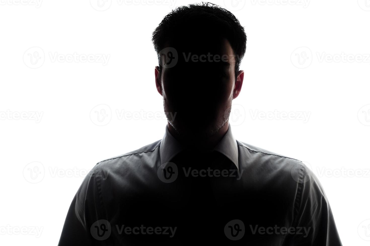 Businessman portrait silhouette wearing a shirt and tie photo