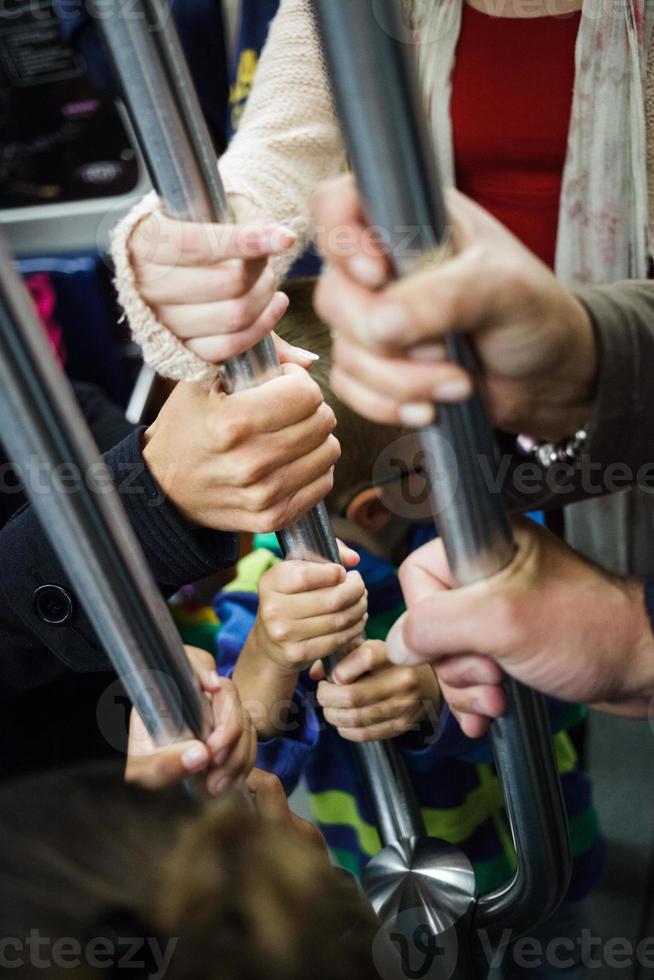 Hands Holding at the Pole photo