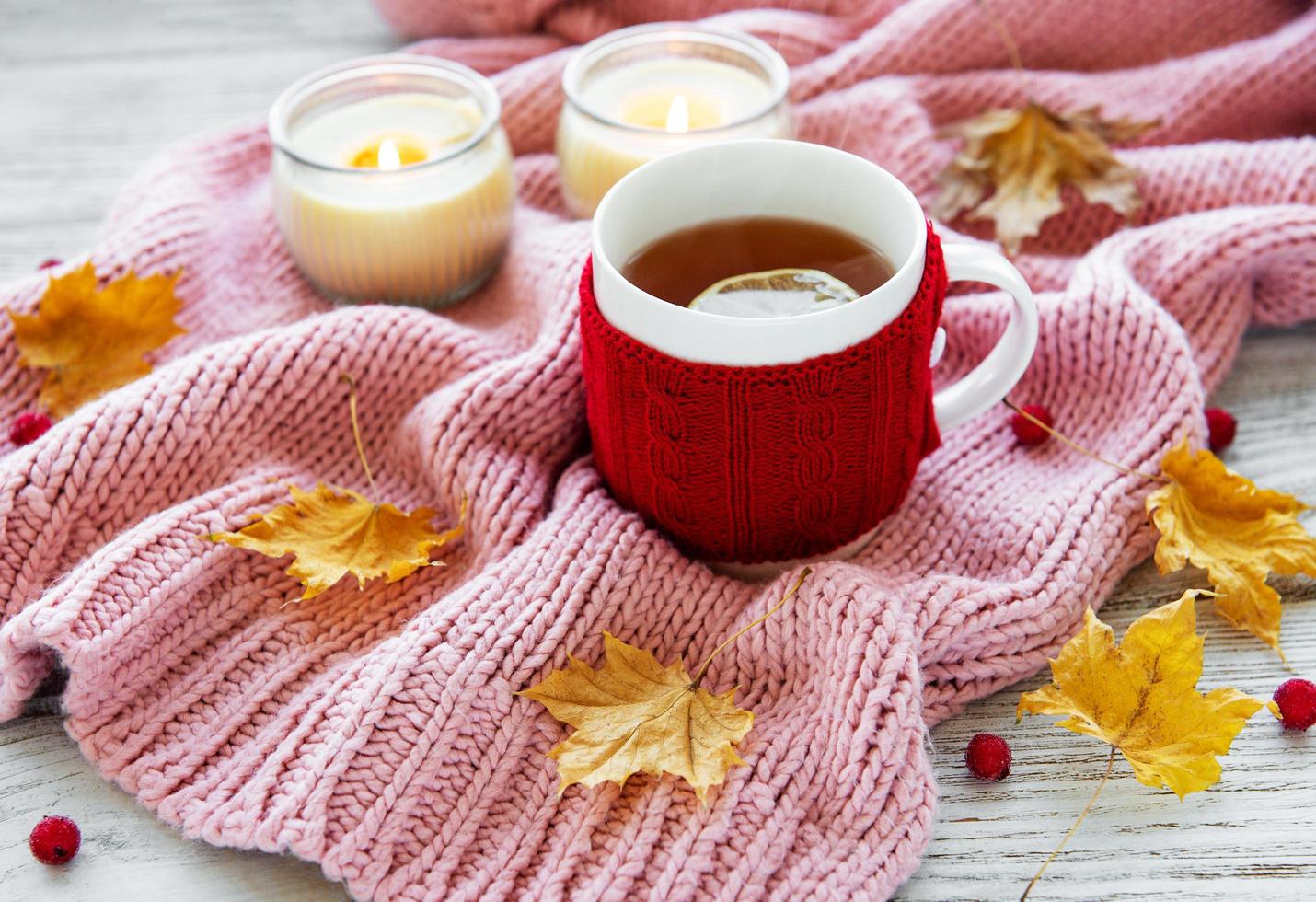 autumn flat lay with cup of tea and leaves photo