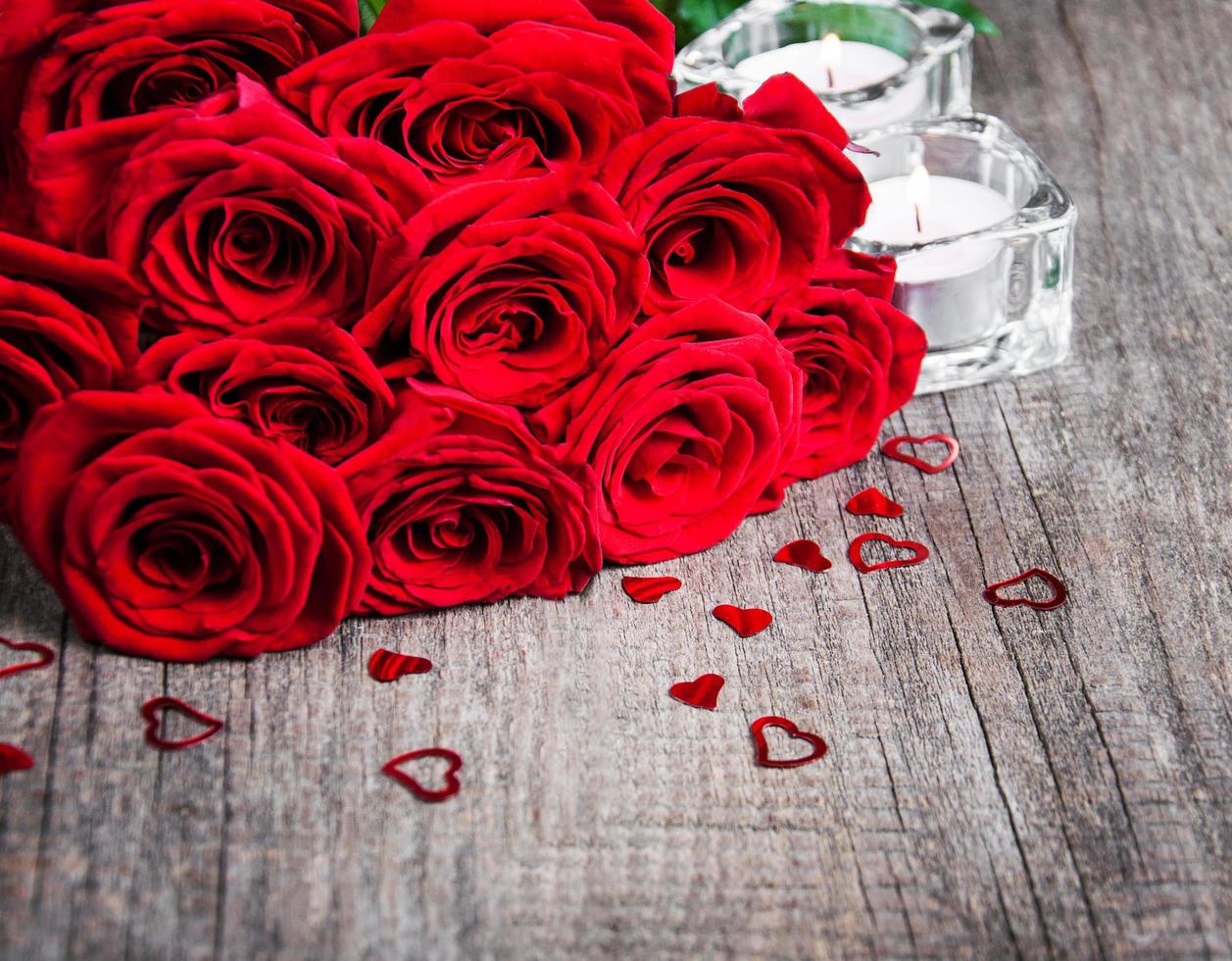 Red roses and candles photo