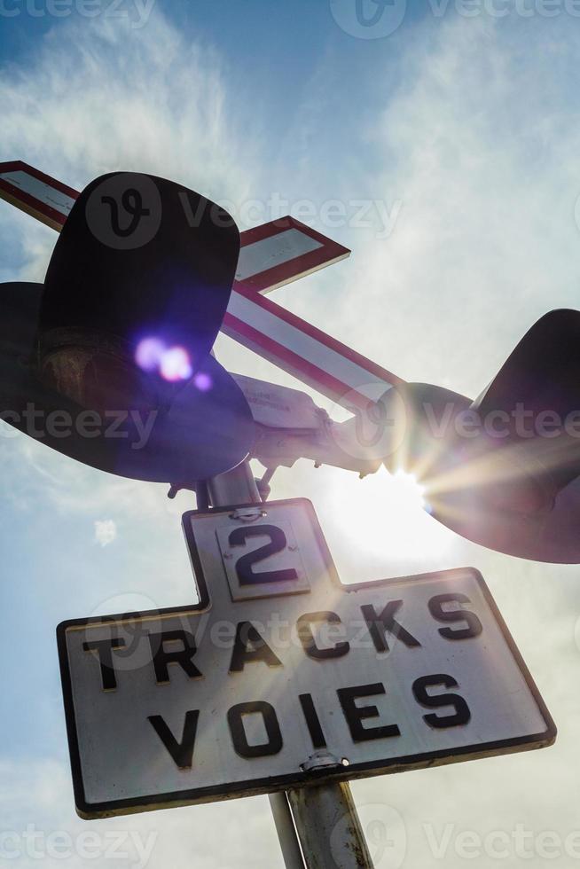 Two Train Track Sign and Light photo