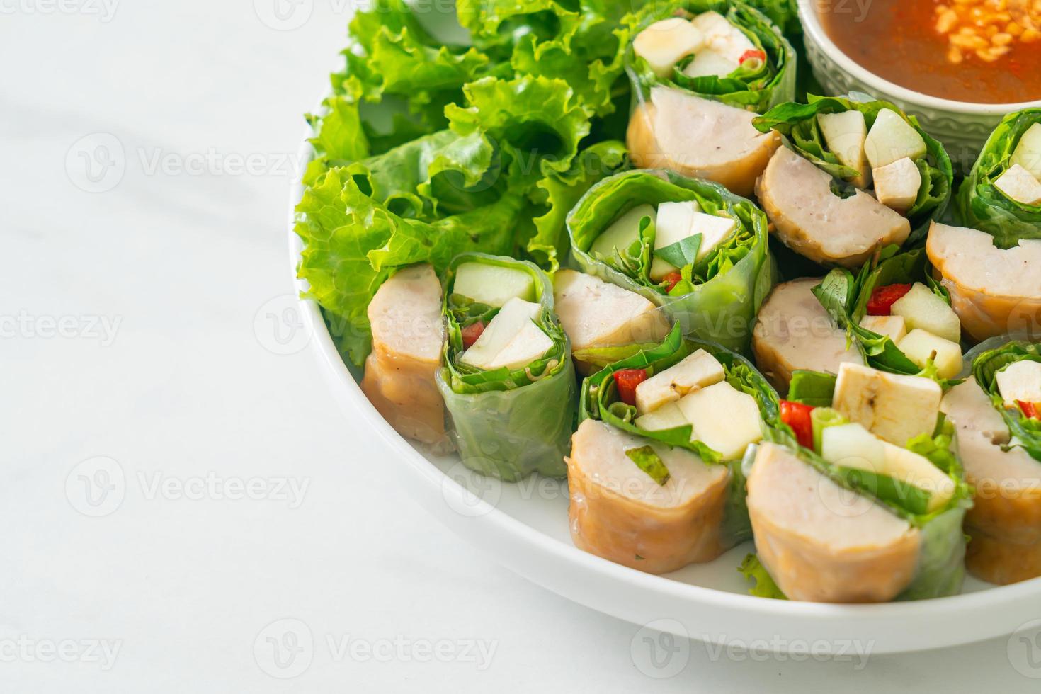 Vietnamese meatball wrap or Vietnamese salad roll or Namnueng or Nem Nuong photo