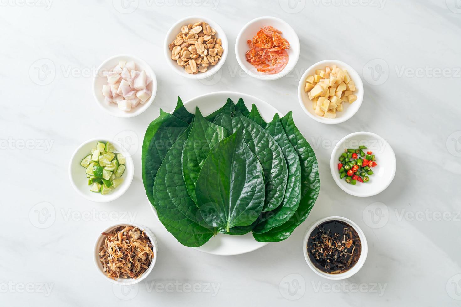 Miang kham - A royal leaf wrap appetizer photo