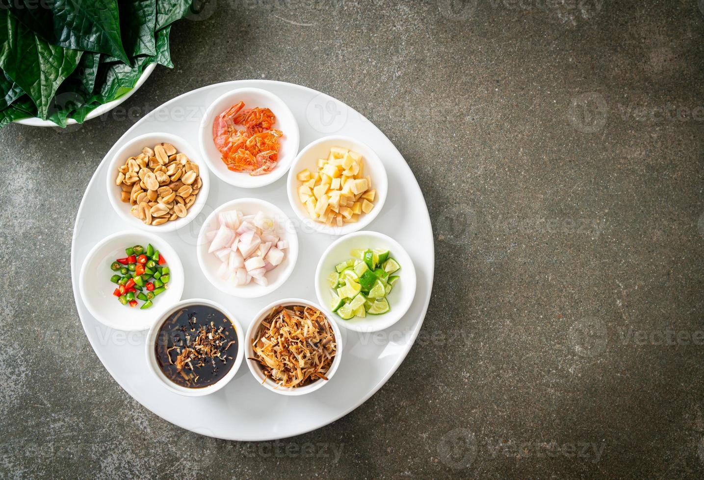 Miang kham - A royal leaf wrap appetizer photo