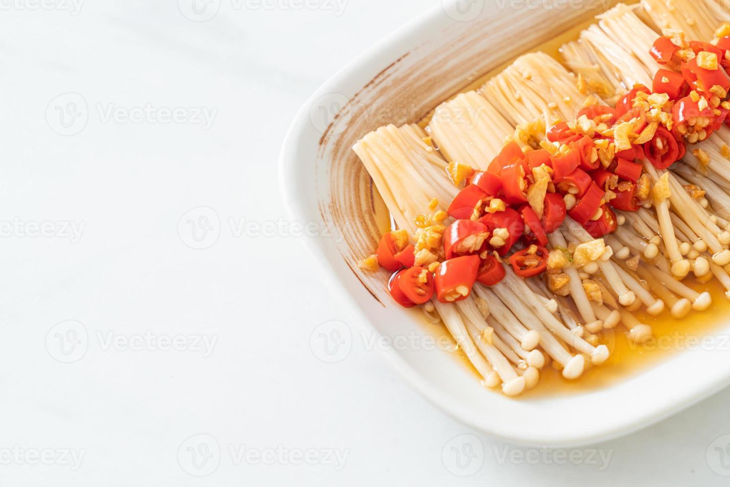 steamed golden needle mushroom or enokitake with soy sauce, chilli and garlic photo