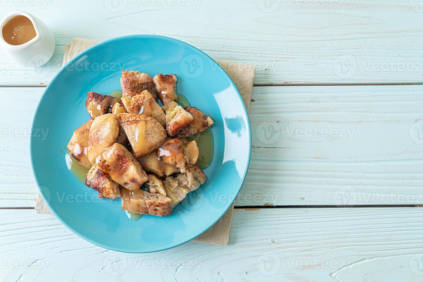 grilled bananas with coconut caramel sauce 4303762 Stock Photo at Vecteezy