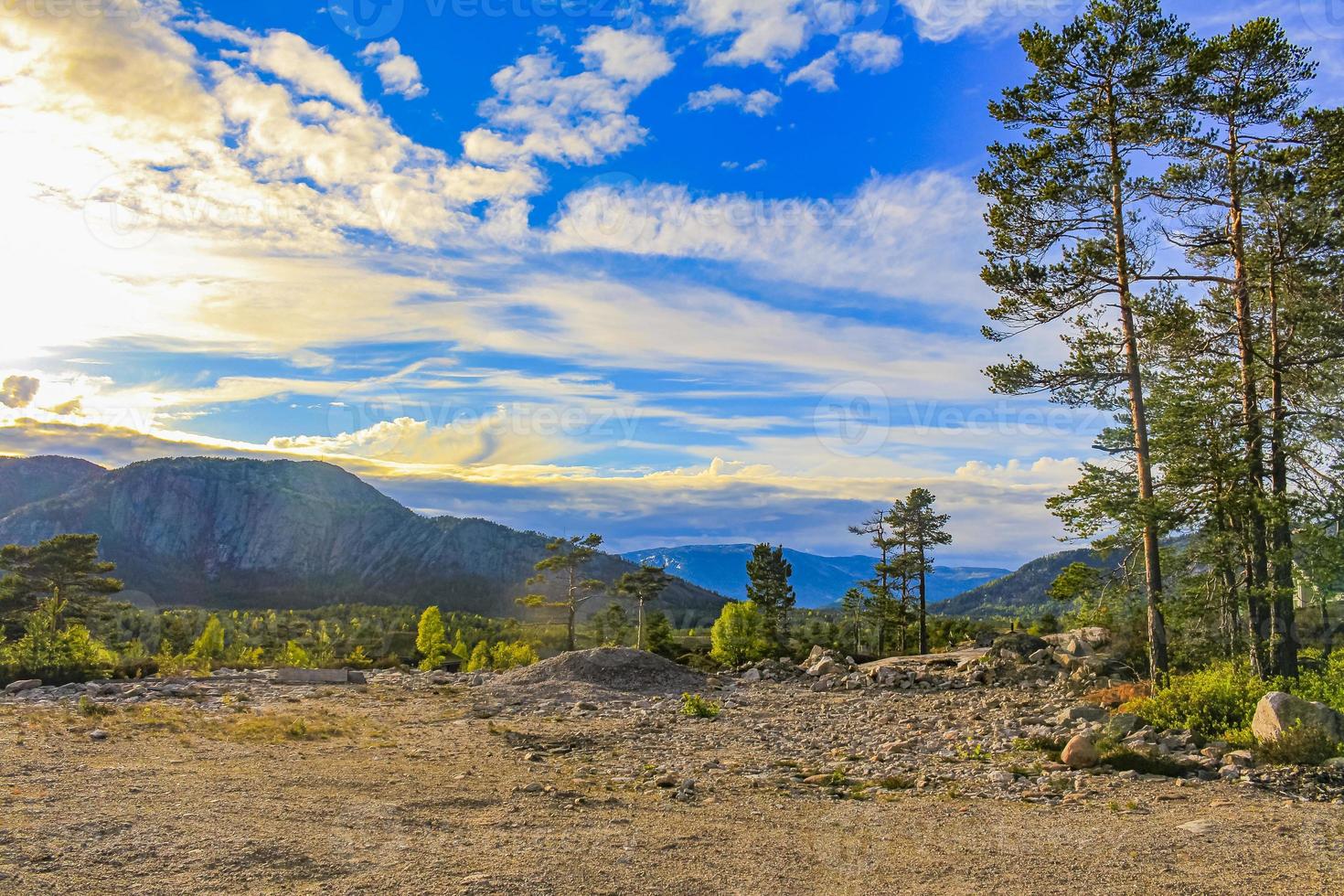 Morning sunrise fog clouds and mountains nature landscape Nissedal Norway. photo