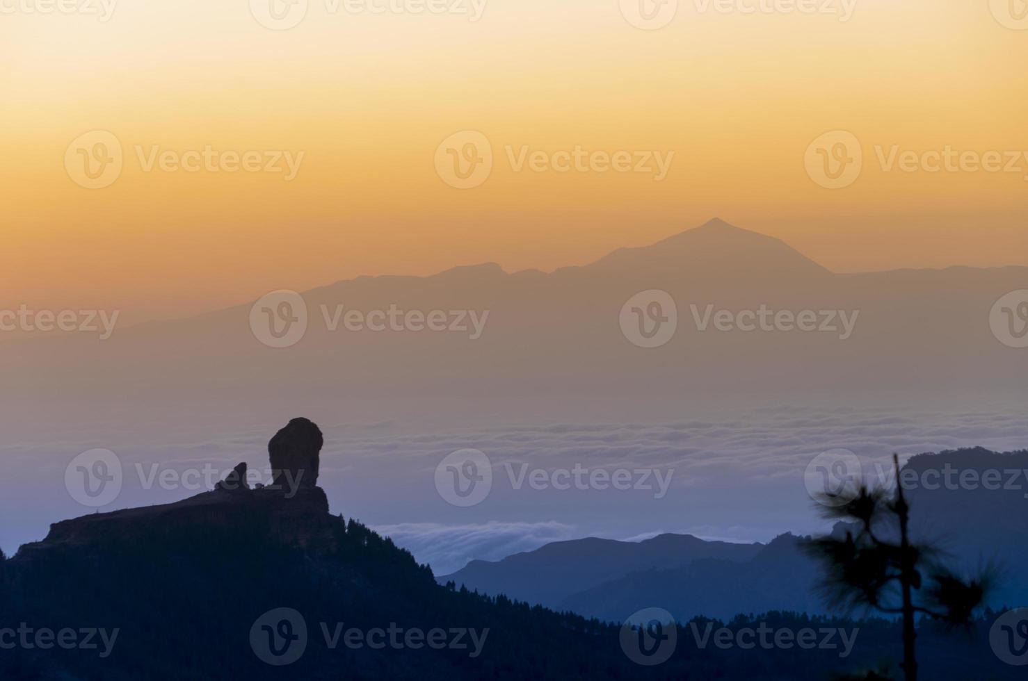 Sunset in the snow mountain, with teide in the background, in gran canaria photo