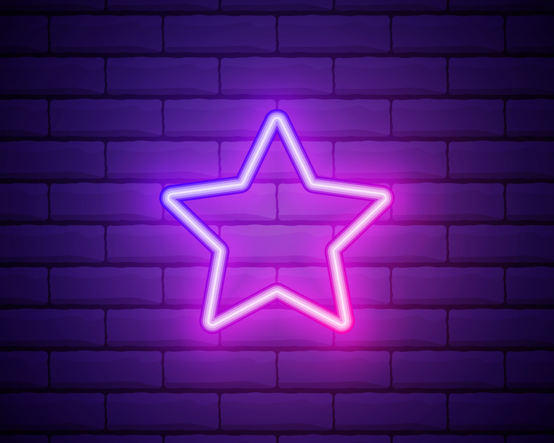 Neon star. Bright pink star frame on brick wall background with