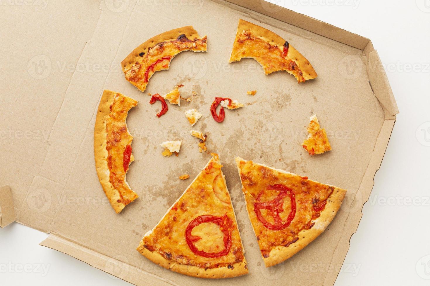 caja de comida de pizza sobrante foto