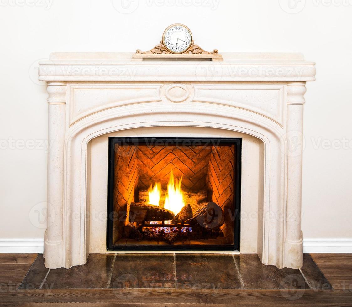 Luxurious White Marble Fireplace and empty wall photo