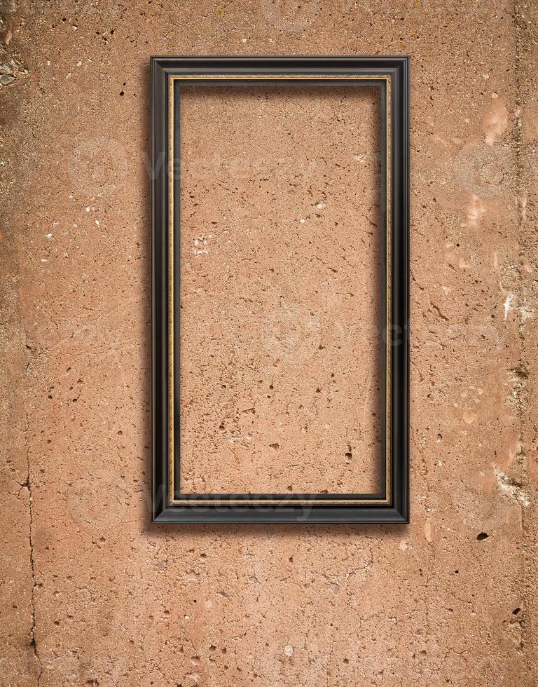 Concrete texture and wooden frame photo