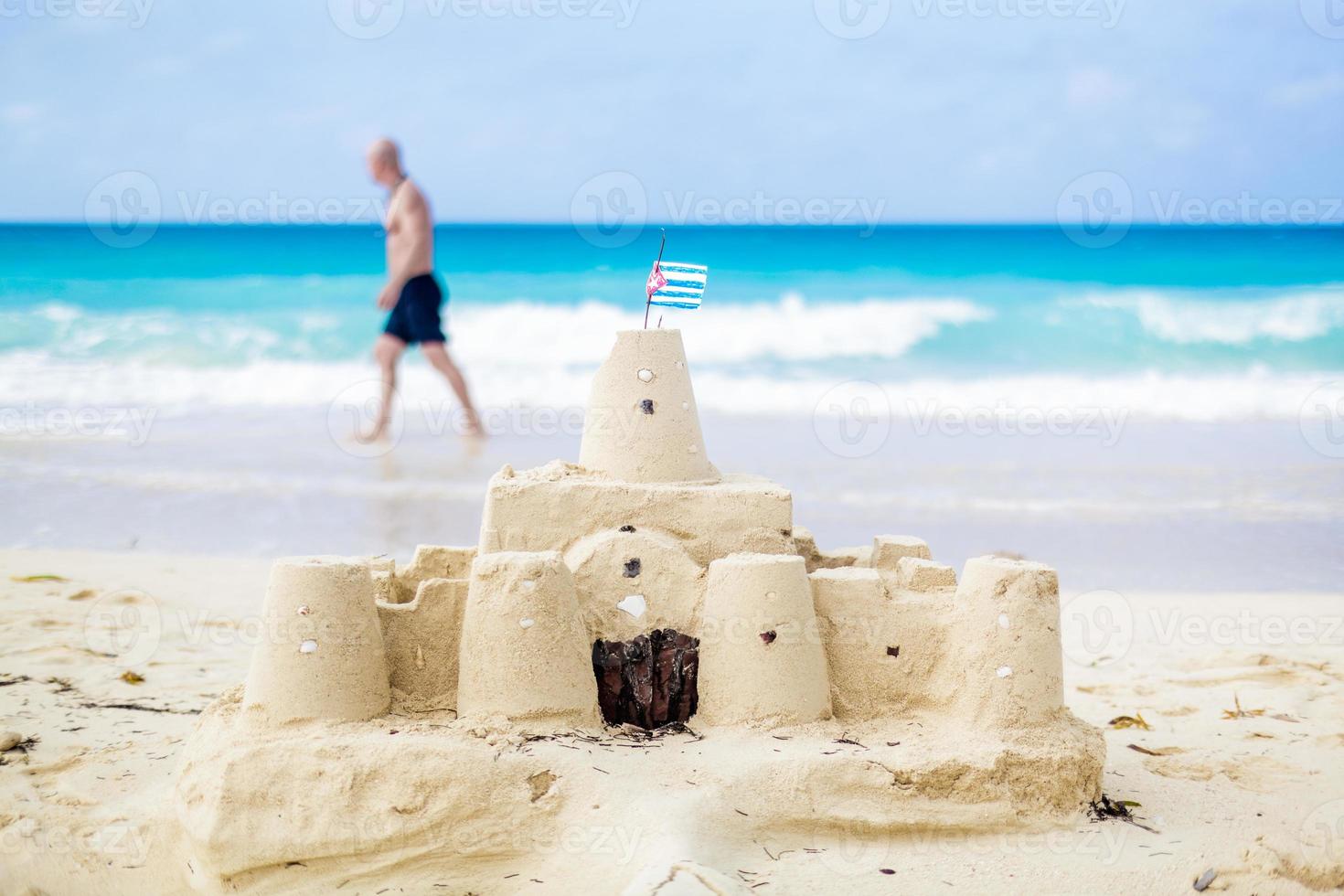 Cuban Sandcastle with the country Flag in Cuba. photo