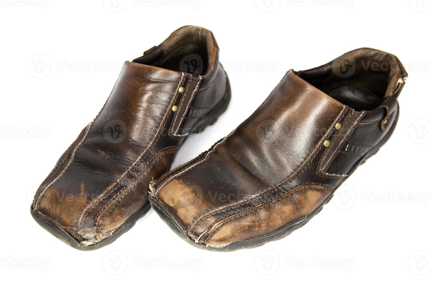 Old Brown Shoes  top view isolated on white background photo