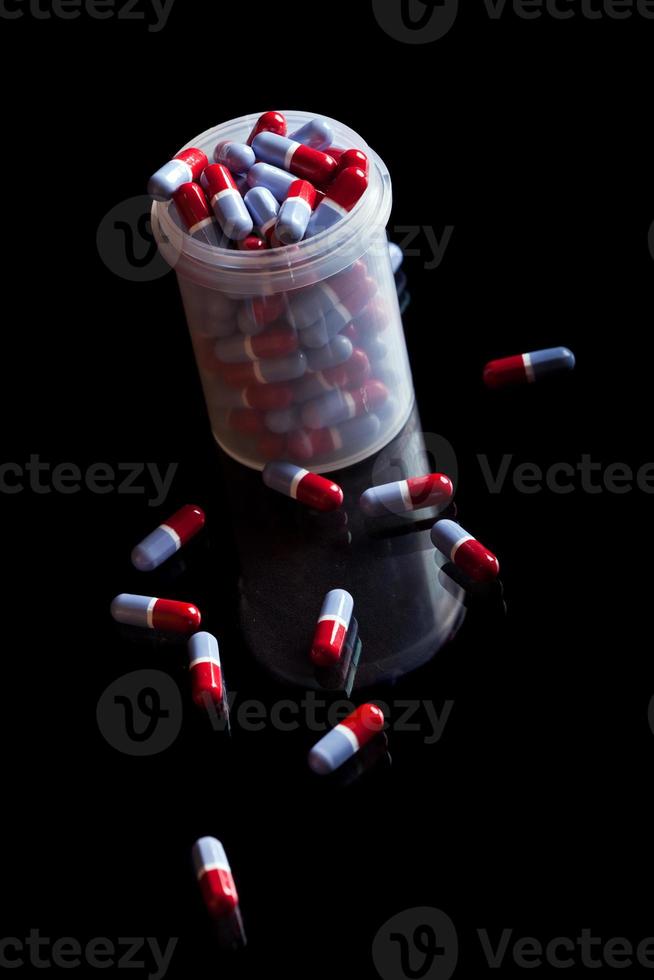 Container full of pills photo