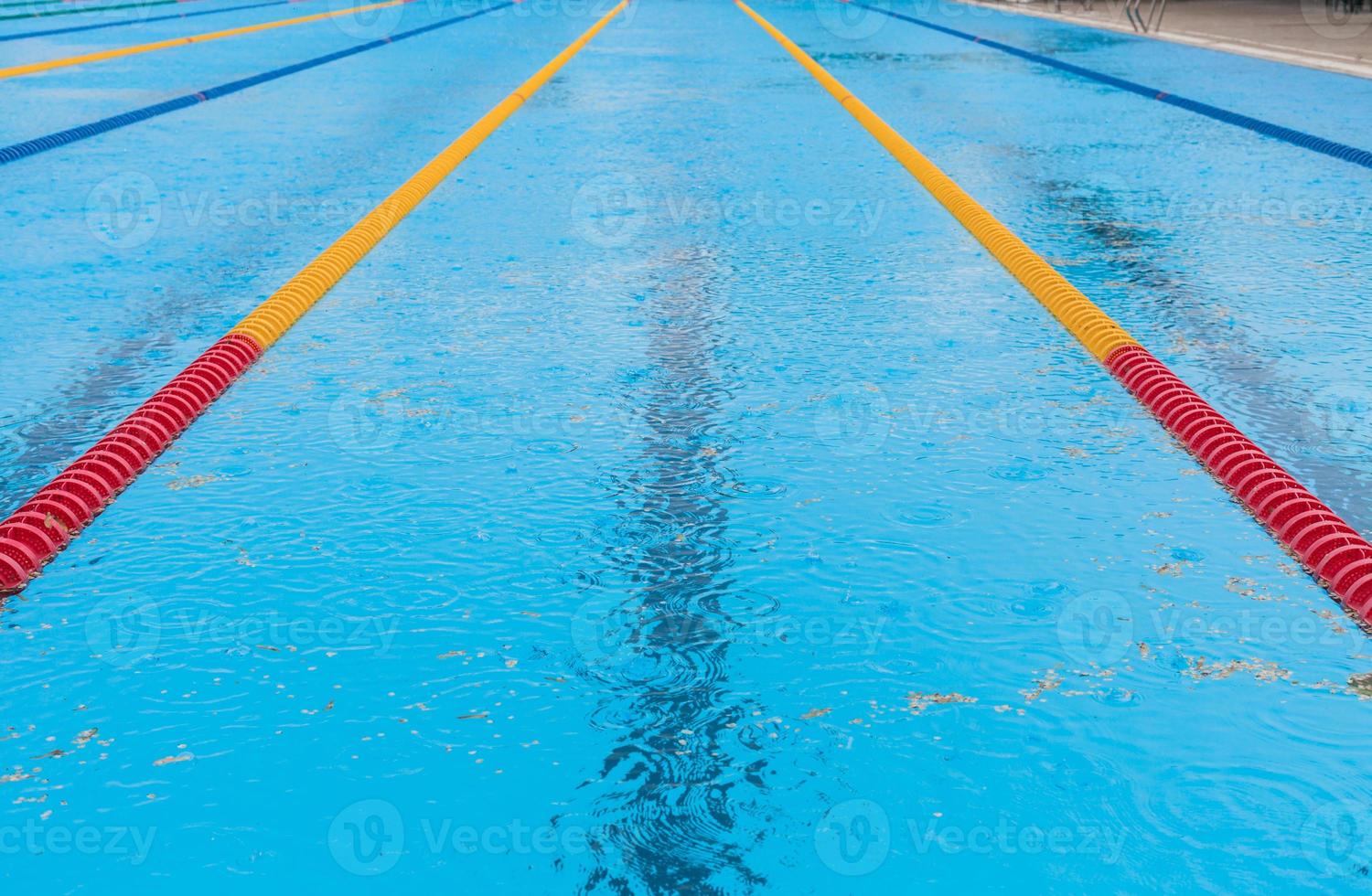 Empty Swimming Pool and rain photo