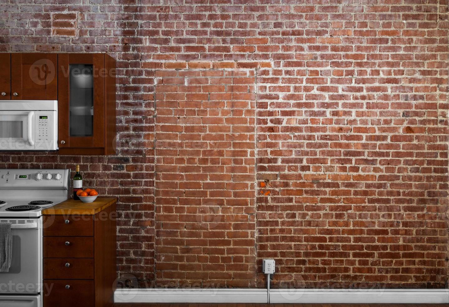 Industrial Old Flat Brick Wall Perspective in a kitchen. photo