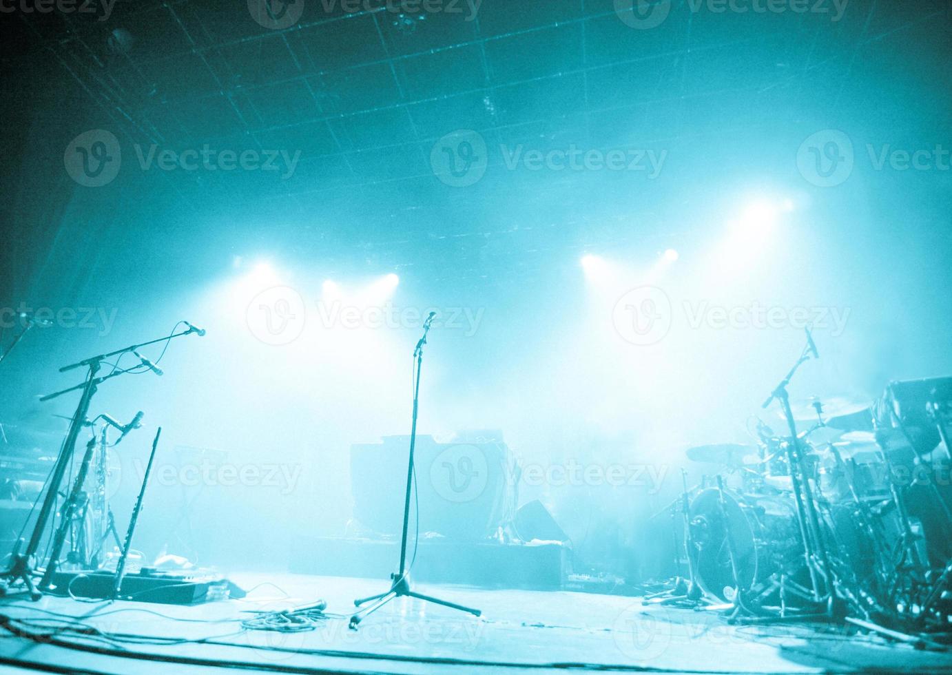 Microphones on empty stage waiting for musicians to come photo