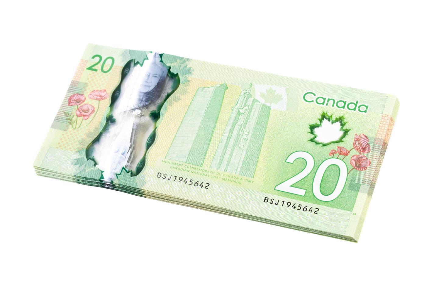 Ottawa, Canadá, 13 de abril de 2013, el nuevo polímero billetes de veinte dólares aislado en blanco foto