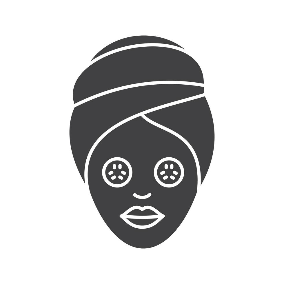 Spa procedure glyph icon. Silhouette symbol. Woman with cucumber facial mask. Negative space. Vector isolated illustration