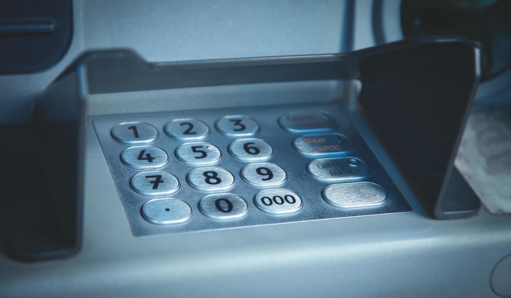 ATM machine with keypad and buttons. photo