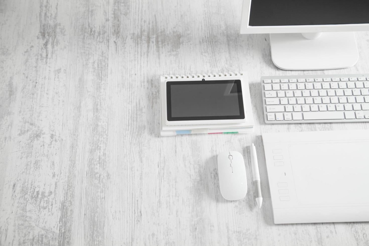 Graphic tablet, mouse, keyboard. Graphic designer workplace photo