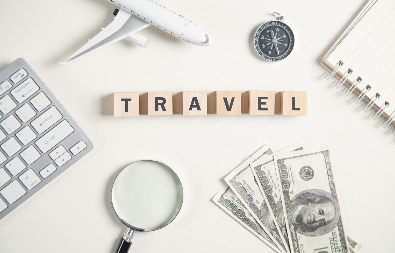 Word travel on wooden cubes. Travel photo