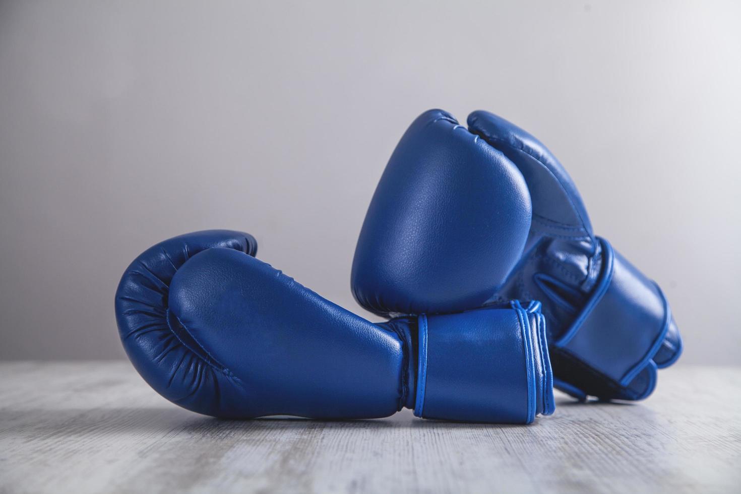 Boxing gloves on white modern desk. photo