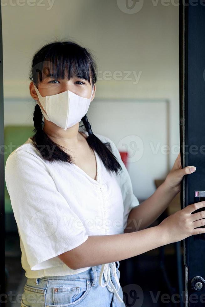 asian woman wearing protection mask photo